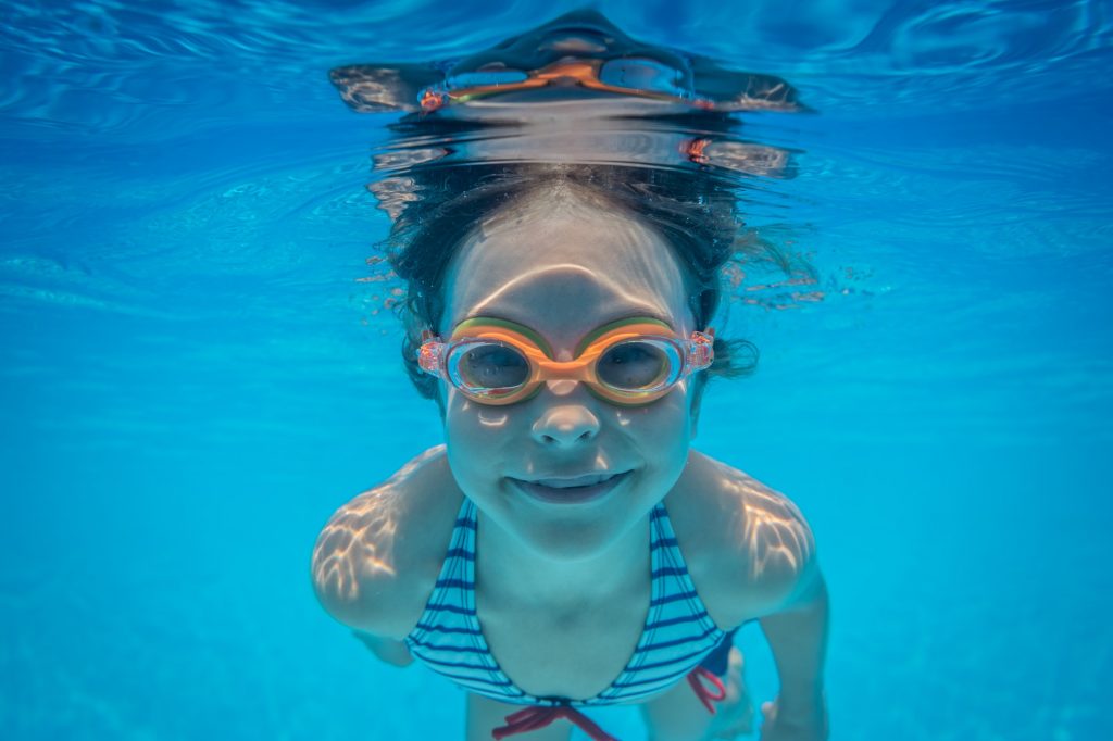 Underwater portrait of child